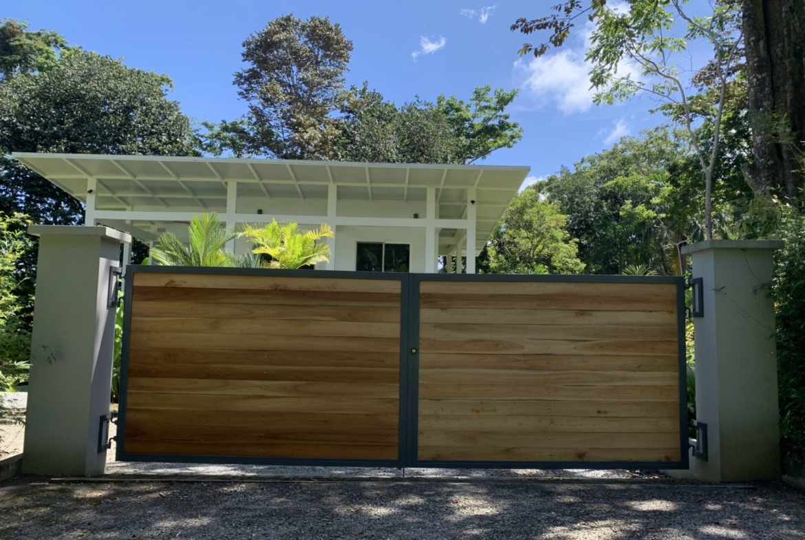 beautiful-pavones-home-with-large-lot-walking-distance-to-beach